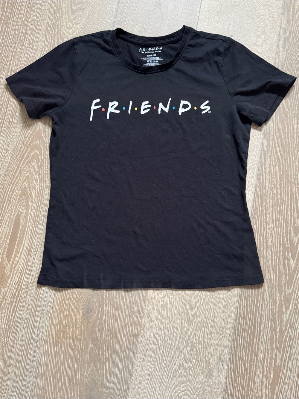 FRIENDS Black Tee with Multicolor Dot Accents
